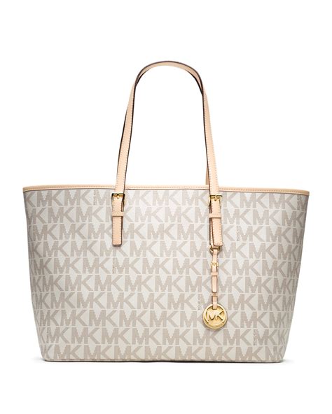 white michael kors purse with mk logo|michael kors white backpack purse.